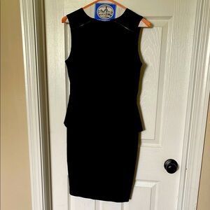 Elegant Black Sleeveless peplum Dress by The Kardashians